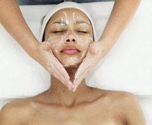 Woman Receiving a Facial Treatment